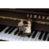 Clayre & Eef 6PR5029 Enfant avec piano Figurine décorative 10x6x10 cm Marron